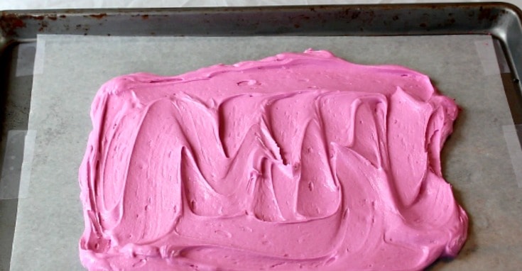 Spreading the pink buttercream to make the shapes