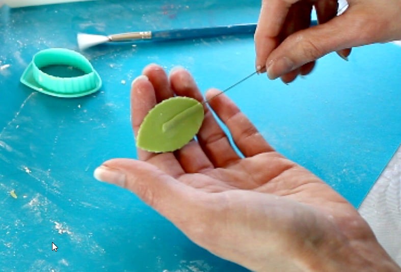 attaching wire to the gumpaste leaf
