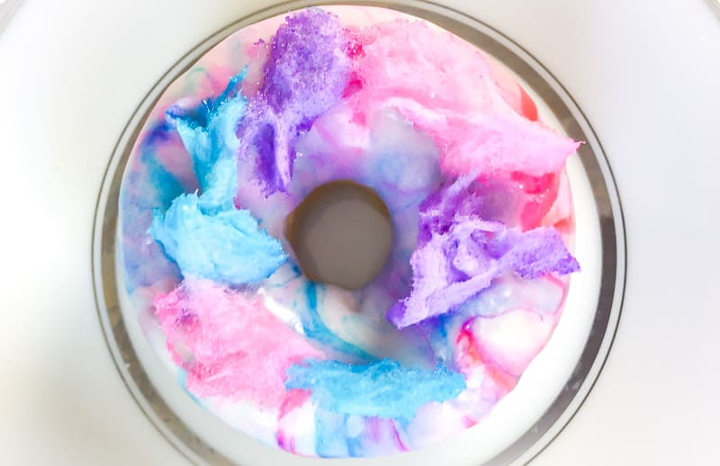 Cotton Candy Baked Cake Donuts with cotton candy on top