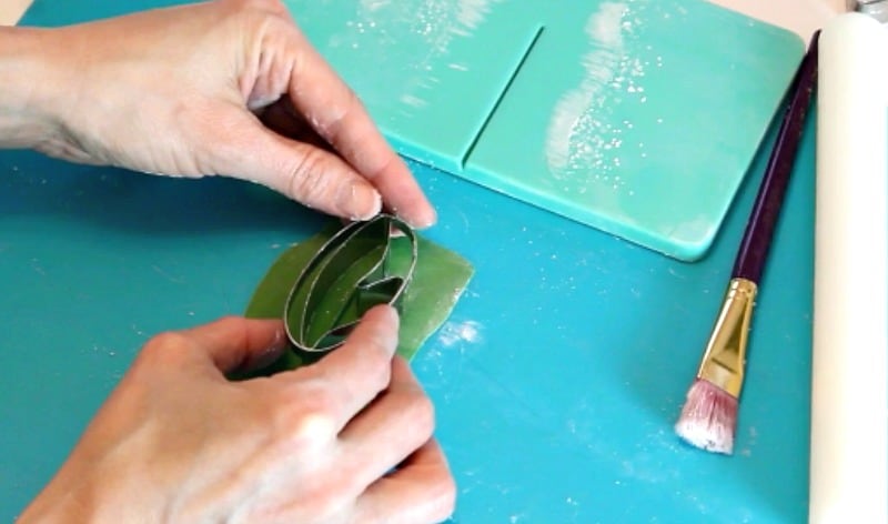 Cutting out gumpaste for the peony leaves