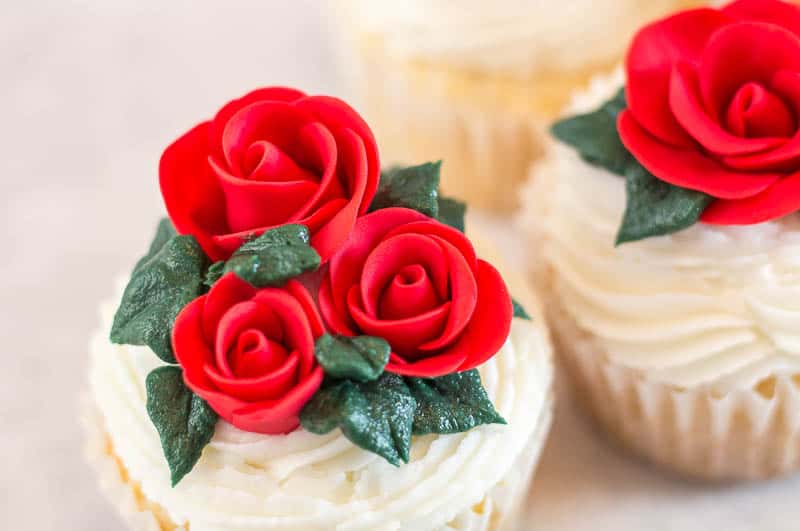 Close up of easy fondant rose on cupcake