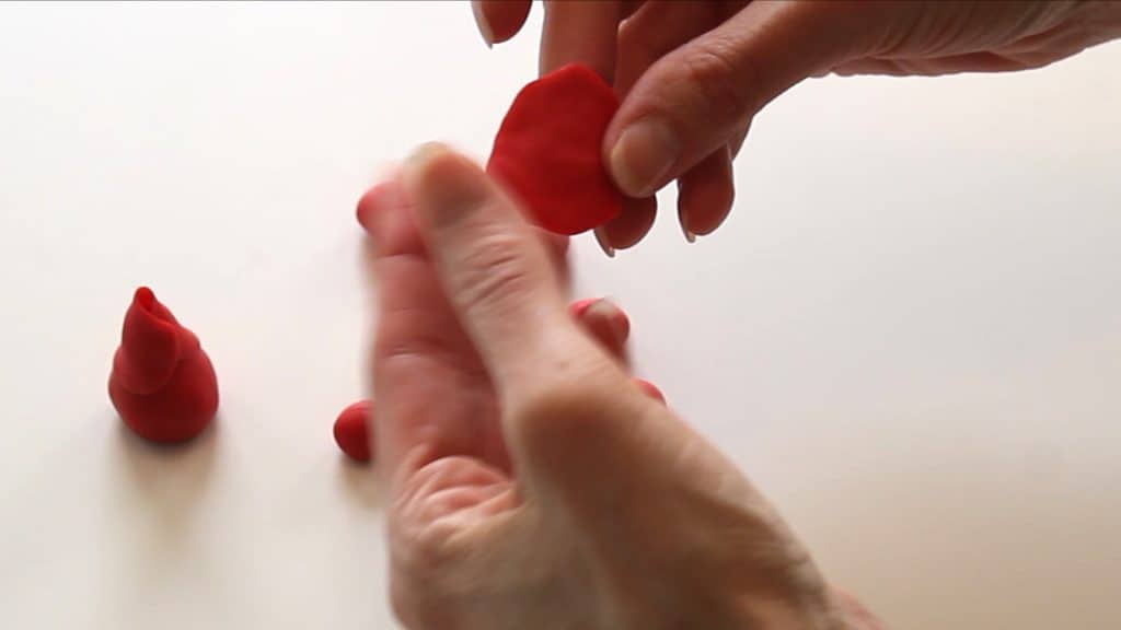 shaping the fondant petals for the first round of petals