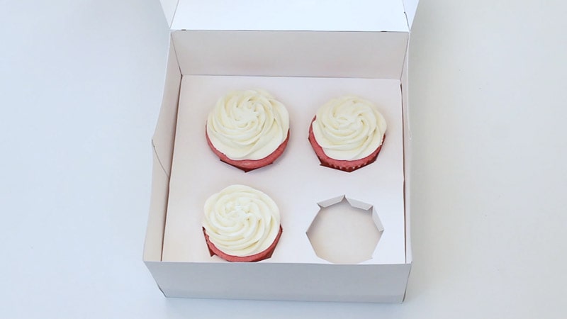 adding cupcake liners to the DIY treat boxes