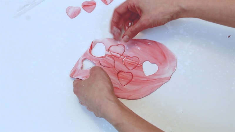 setting fondant hearts aside to dry
