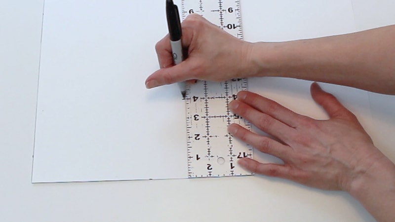 measure up 4 inches from bottom of poster board