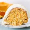 caramel carrot cake bundt cake slice on a white plate