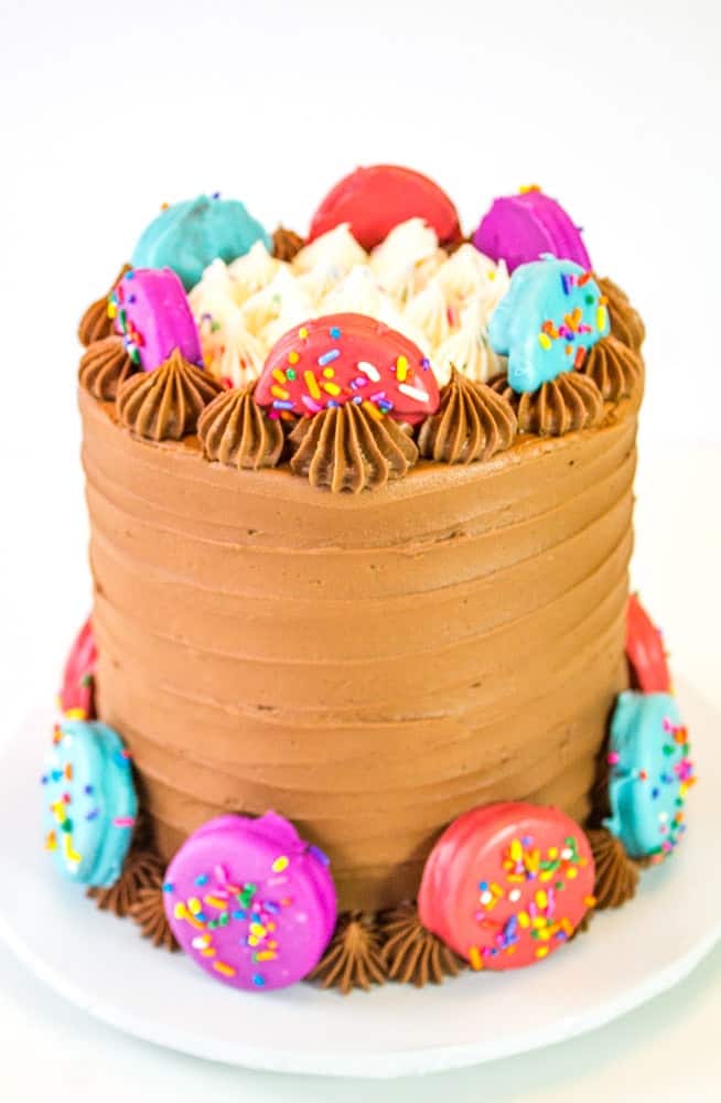 oreo insanity cake with candy dipped oreos