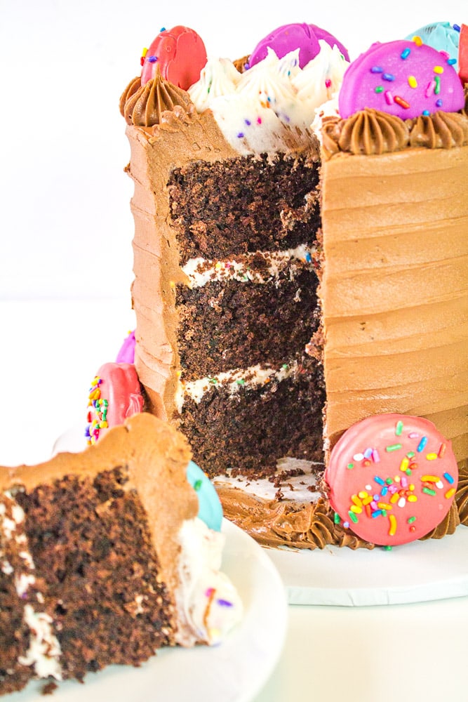 oreo insanity cake with slice cut out