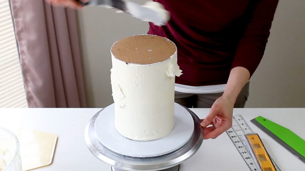 add more buttercream to any holes