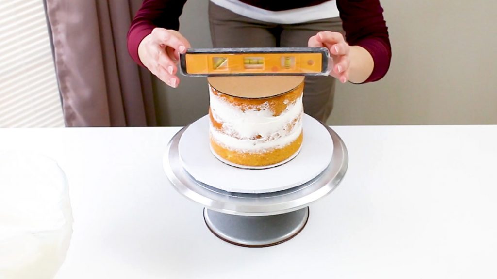 cake with board and level on top