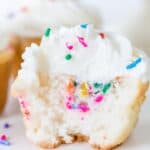 Funfetti Filled Cupcake close up with bite taken out