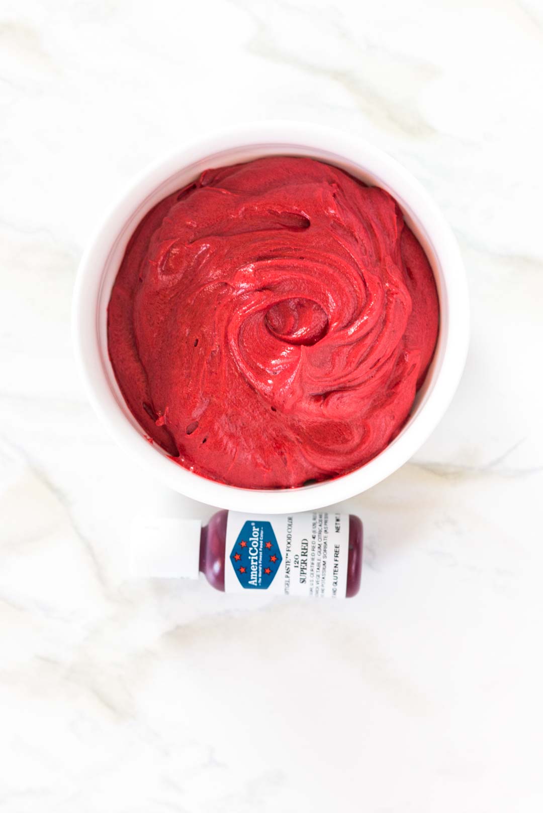 Coloring buttercream red with americolor gel color
