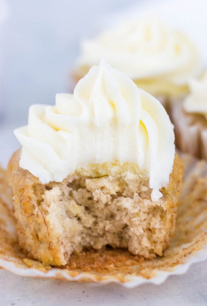 Banana cupcake with large bite out