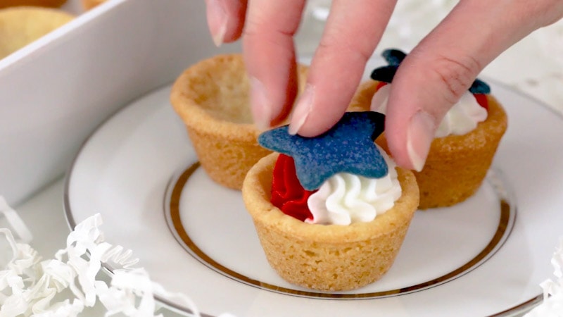 Adding star to patriotic cookie cups