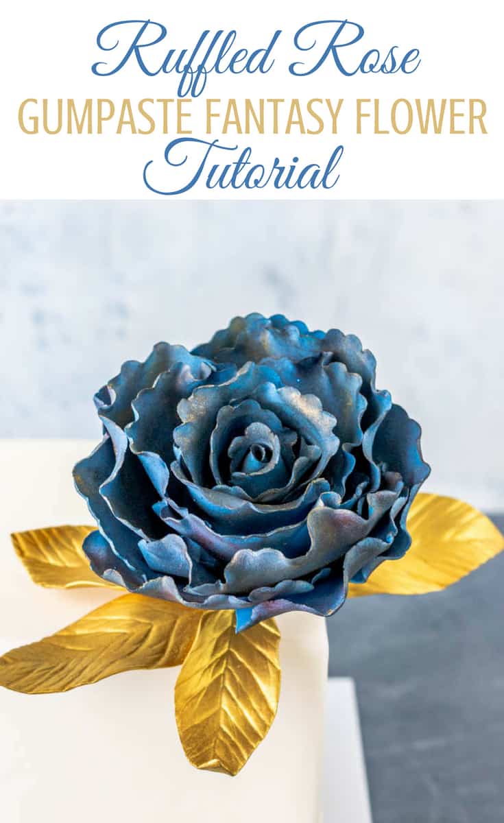 This ruffled rose gumpaste fantasy flower is sort of a combination of a rose and a peony. It's feminine and ruffly and can be made in any color you like. The great thing about this gumpaste rose is that you'll actually use fluted circle cutters instead of petal cutters. #gumpasterose #gumpasteflower #gumpasteruffleflower #cakedecorating