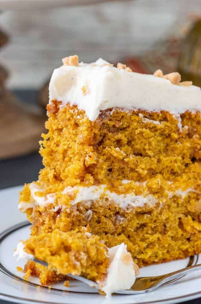 close up view of moist pumpkin cake with toffee bits