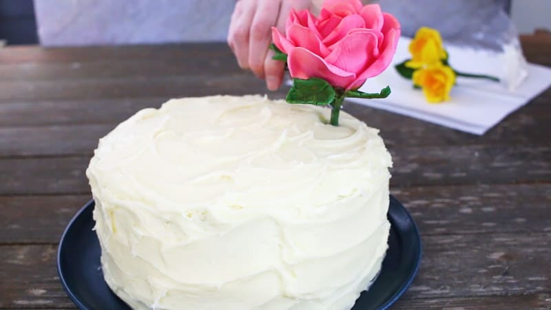 insert the gumpaste flowers into the cake
