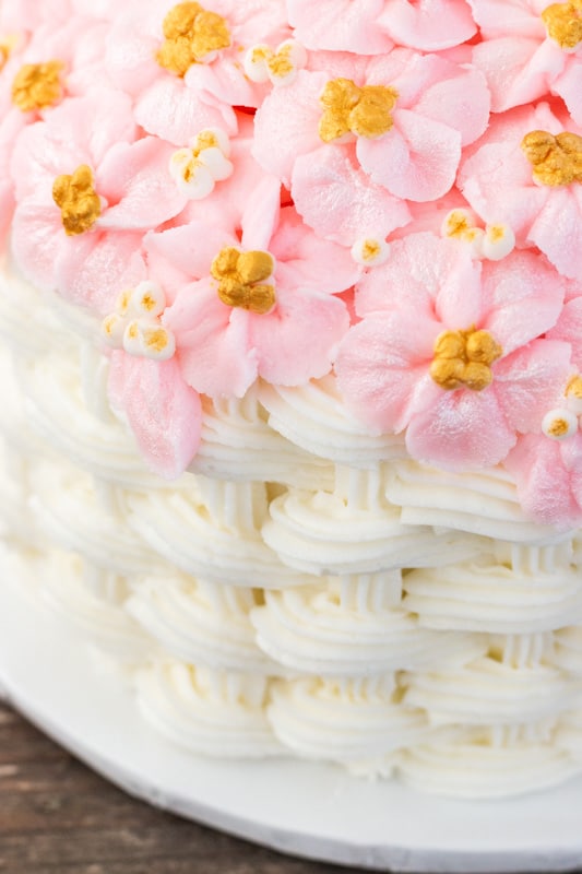 Basketweave Apple Blossom Cake close up view of apple blossoms