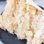 Pineapple Coconut Cake with Pineapple Filling Sliced on a plate