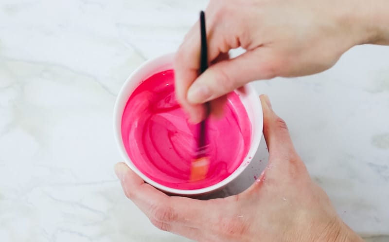 mix pink luster dust with lemon extract