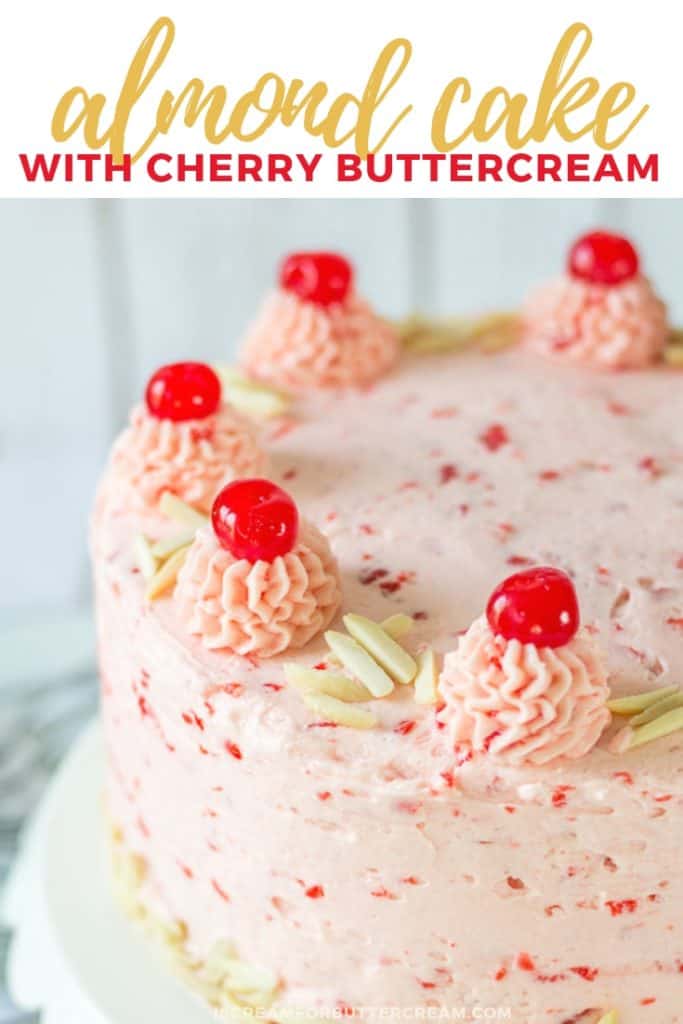 almond cake with cherry frosting pin image