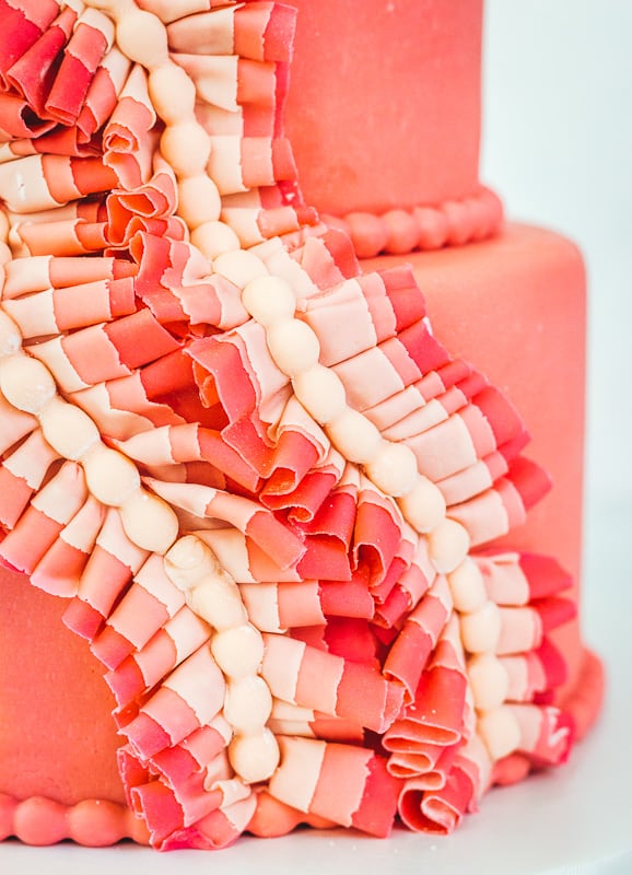 fondant ruffles on a pink fondant cake