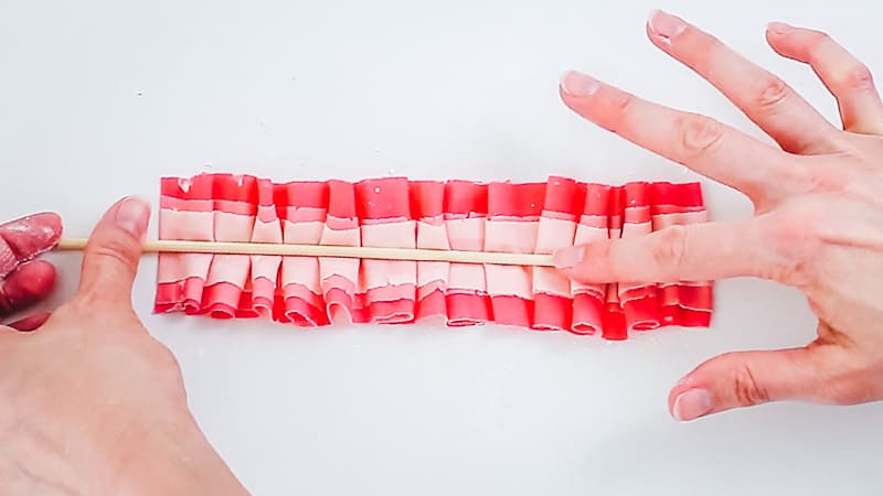 roll skewer onto fondant ruffle strip