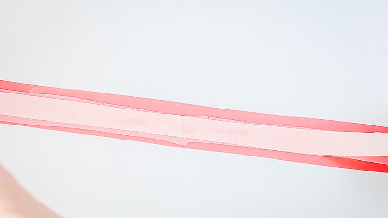 add on the lightest colored fondant strip