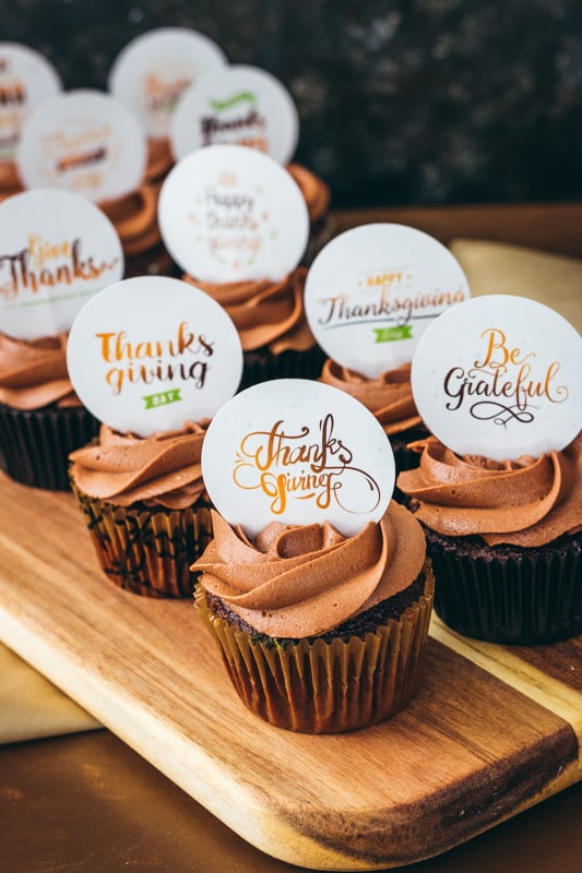 printable thanksgiving cupcake toppers on a wooden server