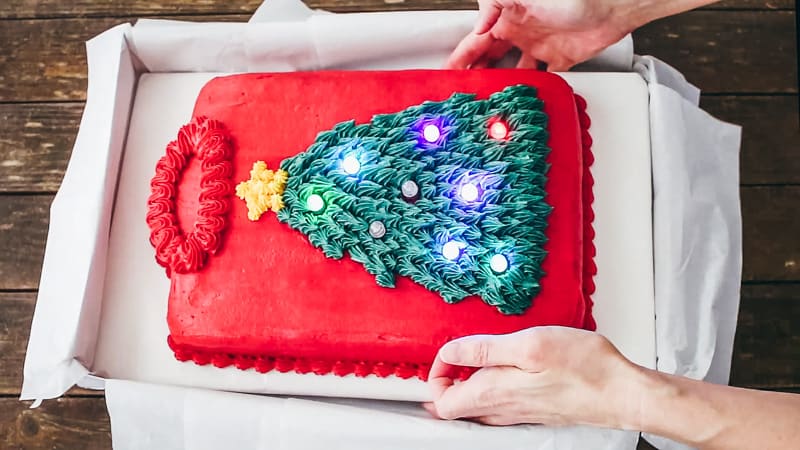 add the sweater cake to the gift box