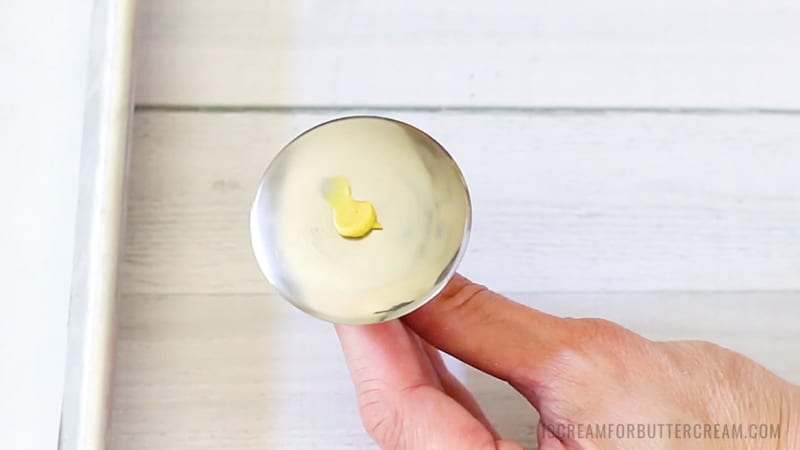 add buttercream to flower nail