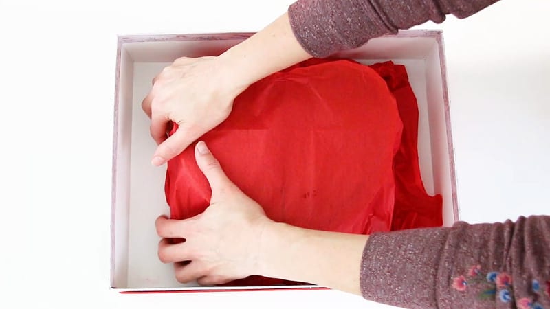 add red tissue paper to floral foam