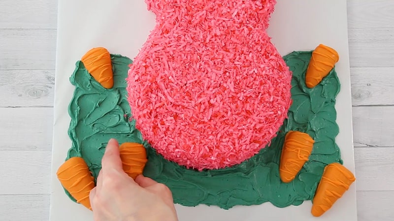 adding cake carrots to the board