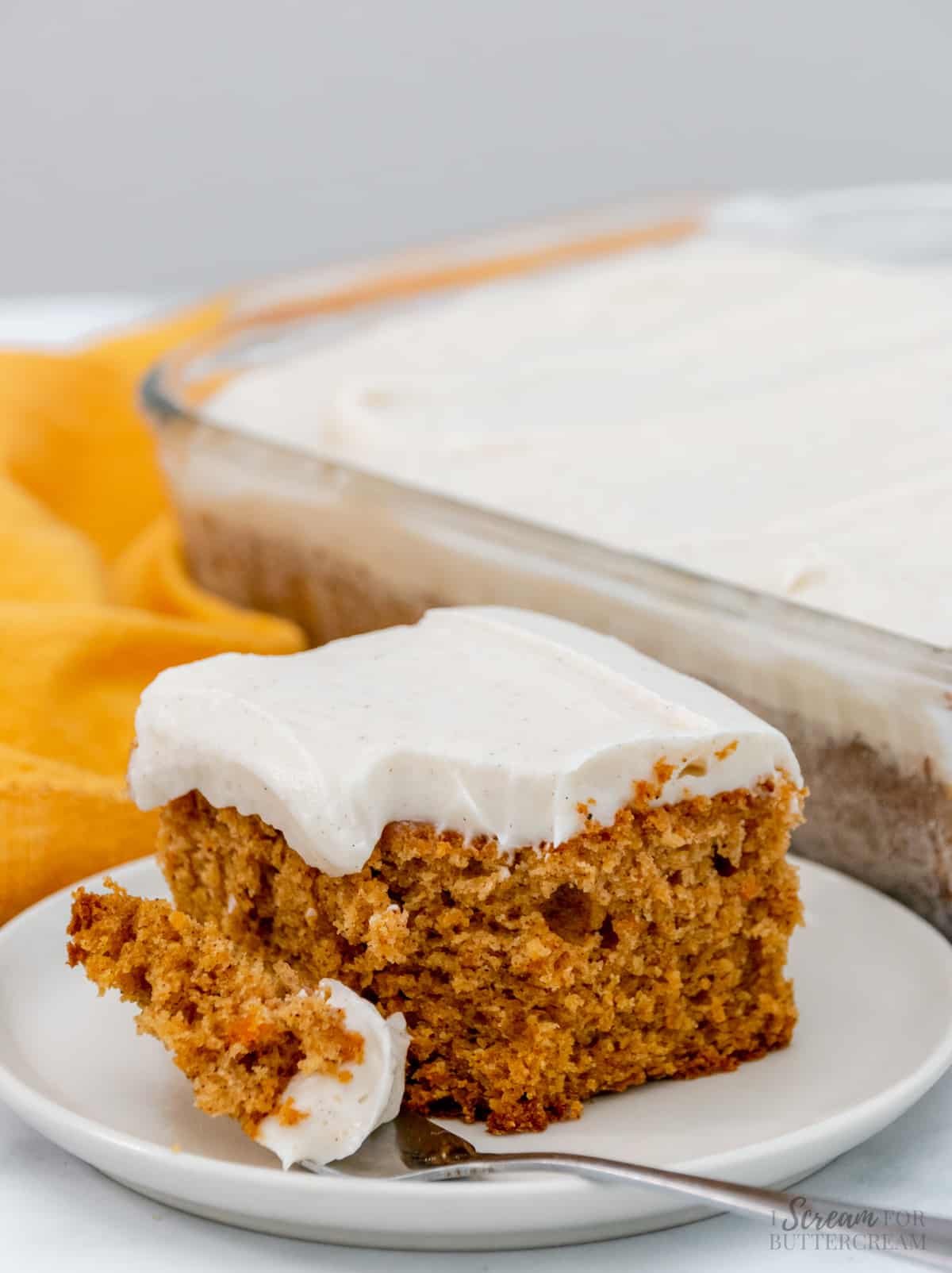 sweet potato cake with fork on a white plate