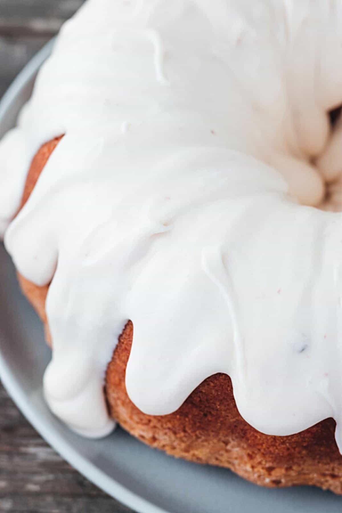 Cake with cream cheese drip frosting.