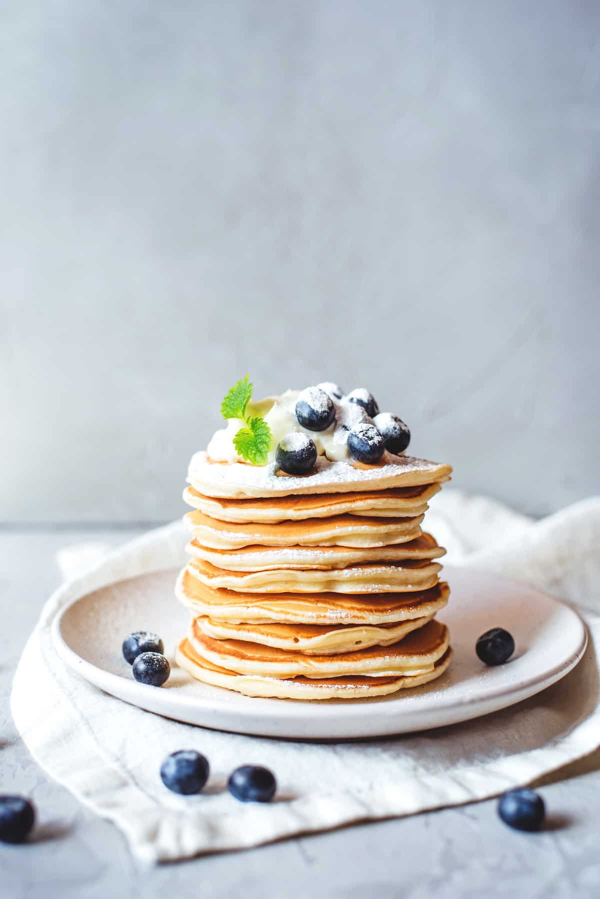 Powdered sugar sprinkled on pancakes.