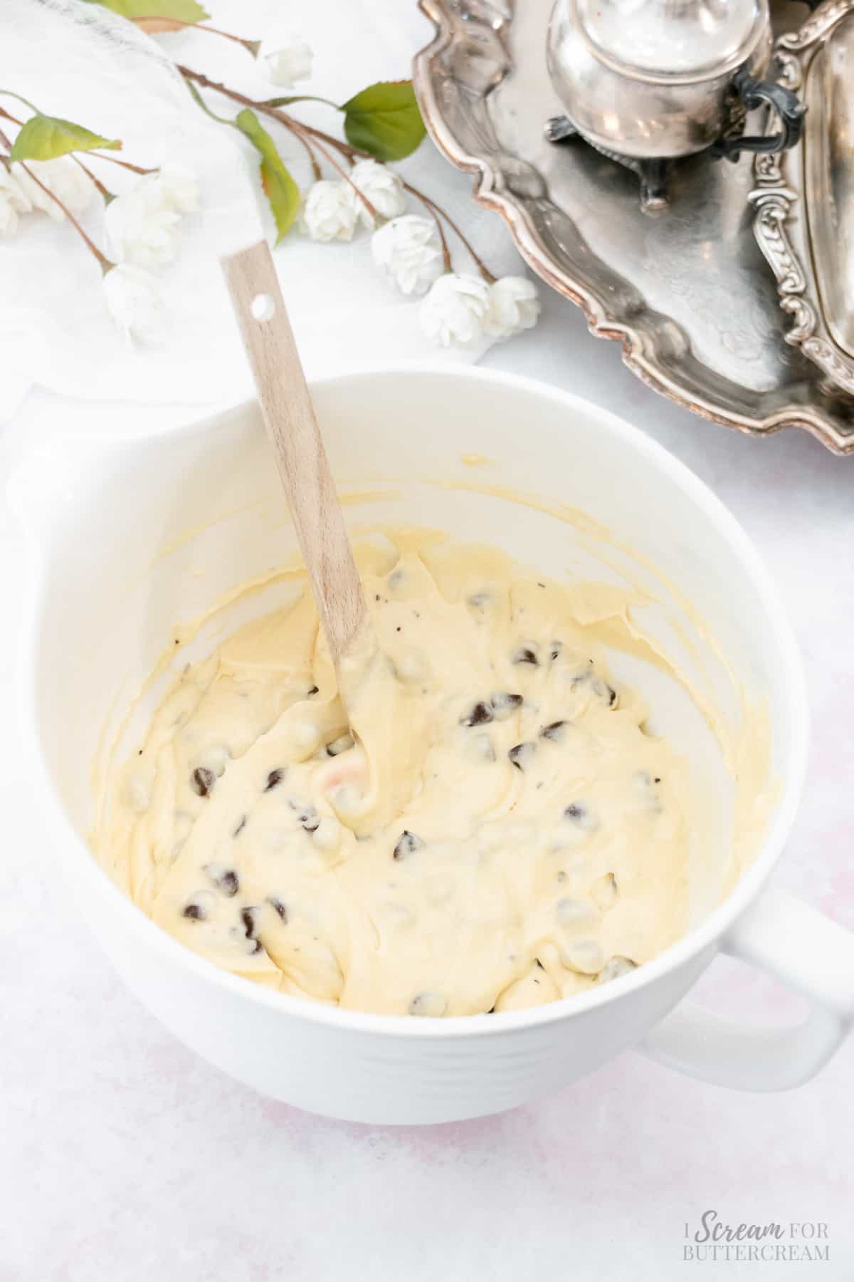 Bowl with chocolate chips added to batter.