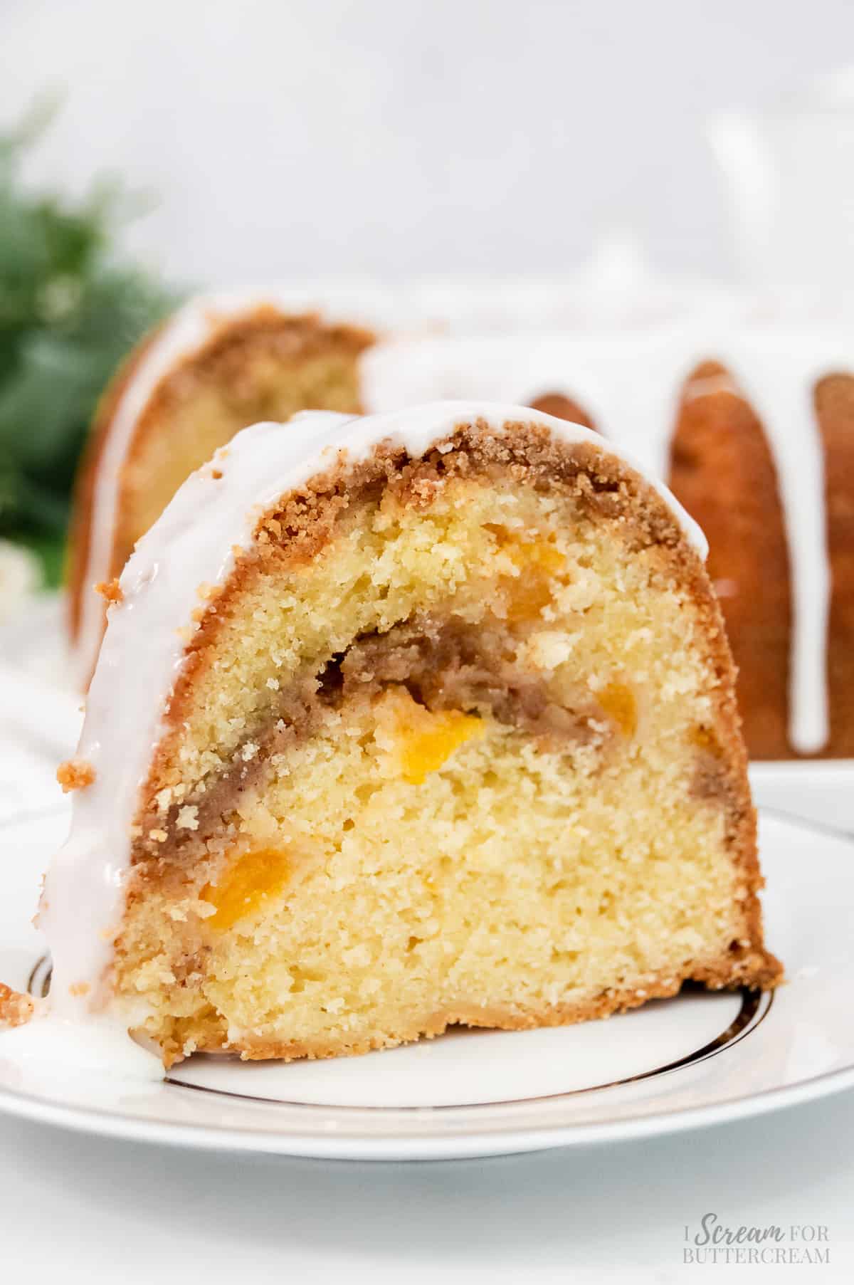 Close up view of pound cake with peaches.