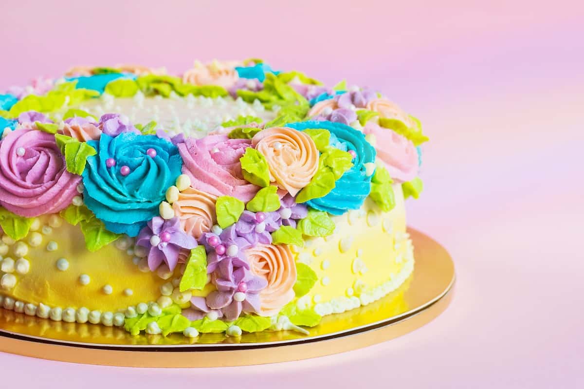 Colorful piped cake with buttercream.
