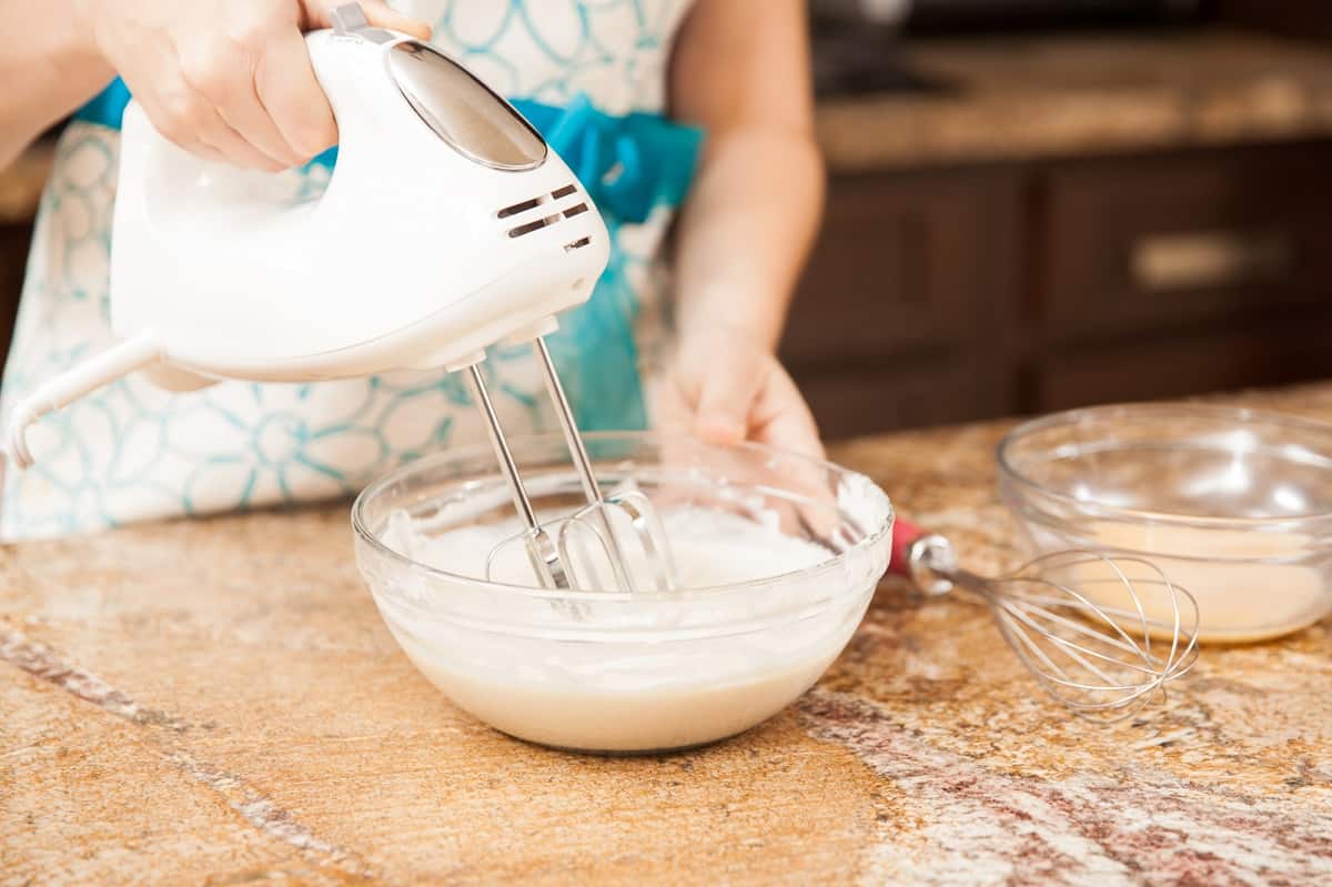 Mixing cake batter in a bowl.