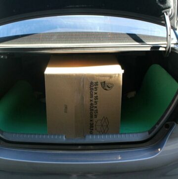 Cake box in the trunk of the car.