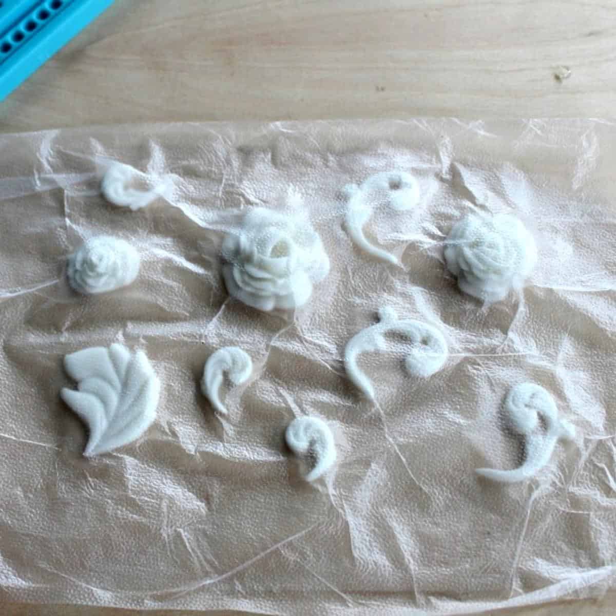 https://iscreamforbuttercream.com/wp-content/uploads/2022/10/fondant-decor-in-plastic-wrap.jpg