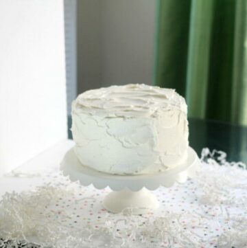 White layer cake on a table.