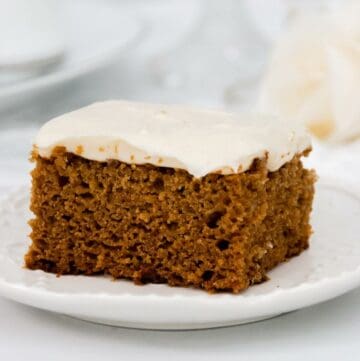 Featured image of large slice of apple butter cake.