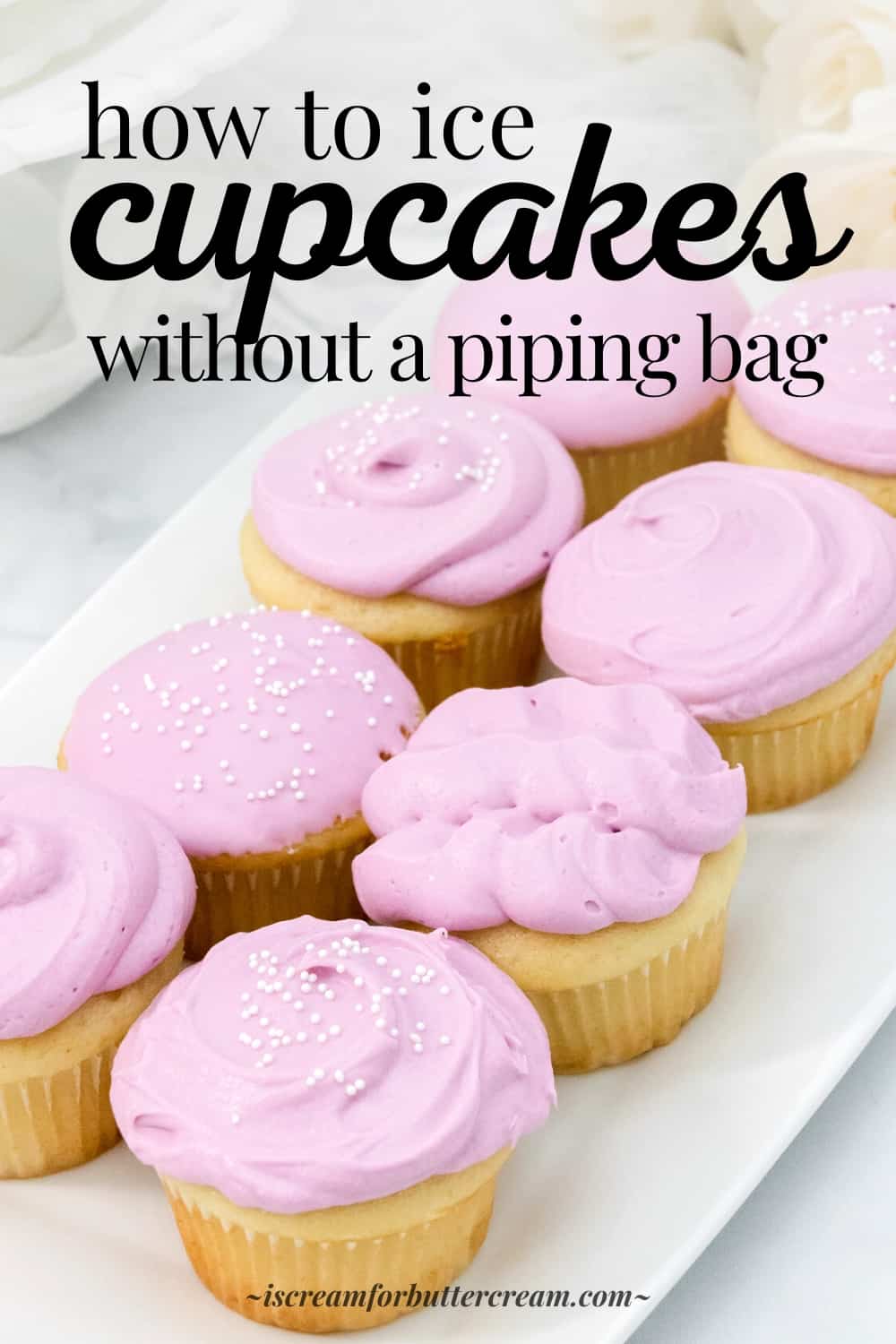 Pinterest image with text overlay and decorated cupcakes with light purple frosting.