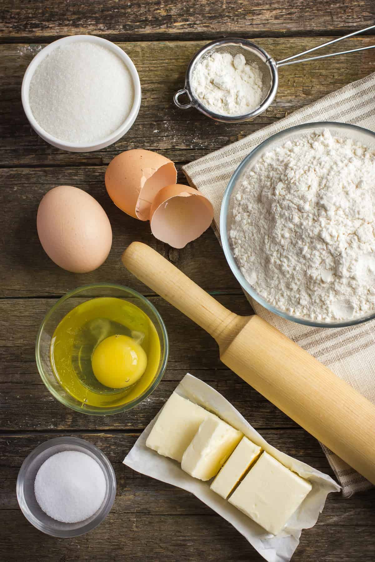 Baking ingredients on a wooden table.