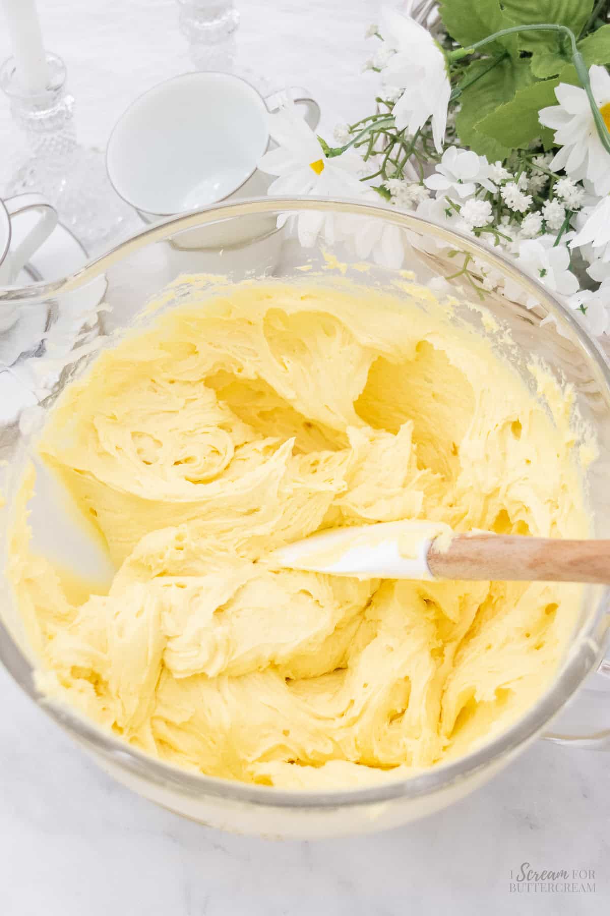 Lemon cream cheese cake batter in a mixing bowl.