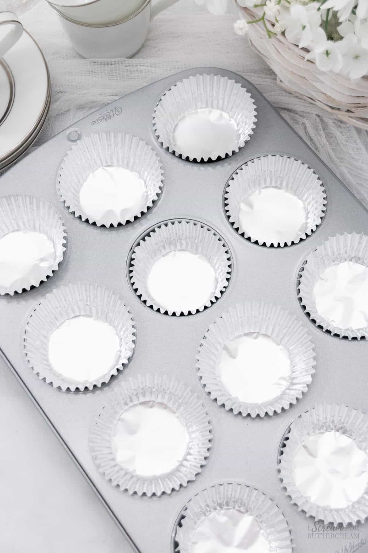 Cupcake pan with cupcake liners.