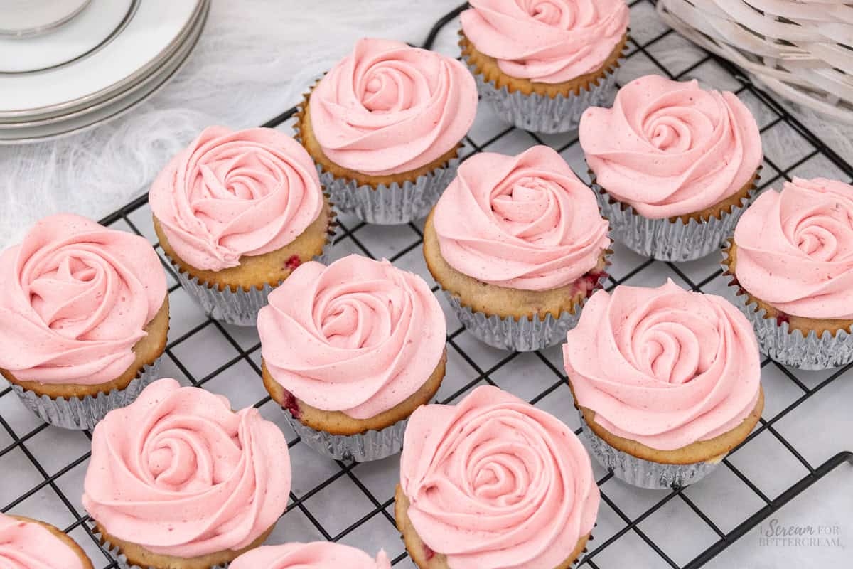 Top view of cupcakes decorated with pink buttercream.