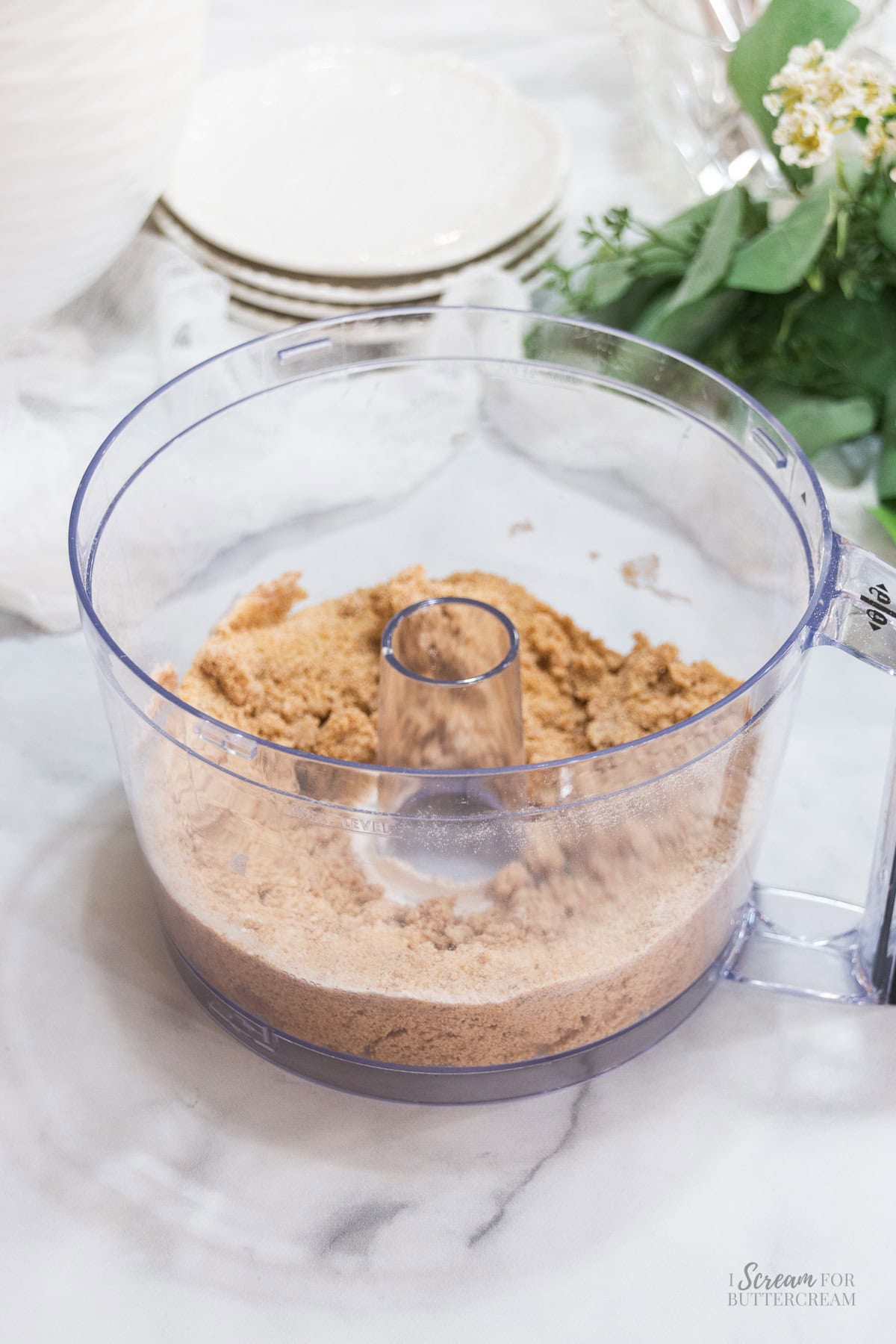 Cinnamon crumb topping mixed in a food processor for chocolate chip coffee cake.